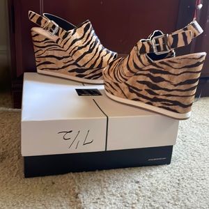 Tiger Calf Hair Platform shoes from Dolce Vita! This is a Dillard Brand shoe